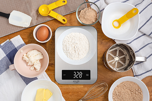 Flour on digital scale with cookie ingredients